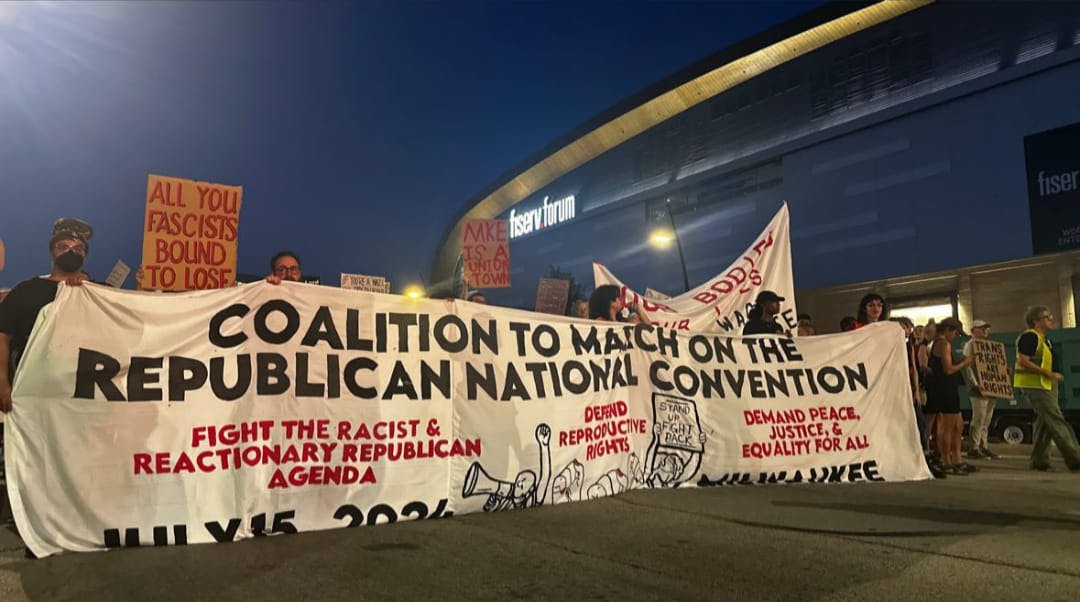 Marchers with banner